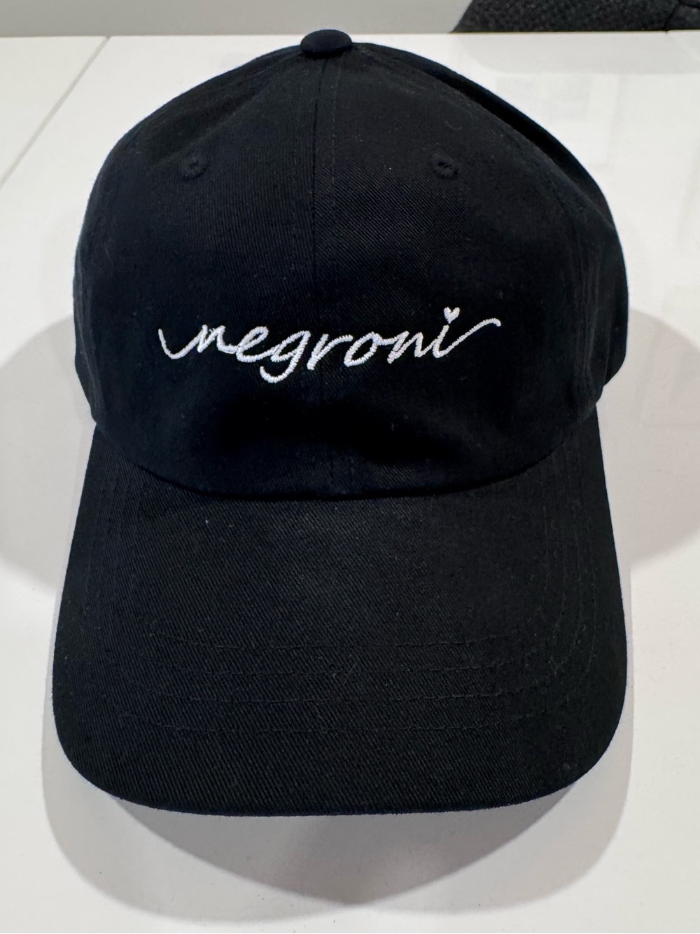 The Classic Black Cap with White Negroni Embroidery